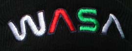 The embroidered letters WASA closeup on one of our woollen hats.