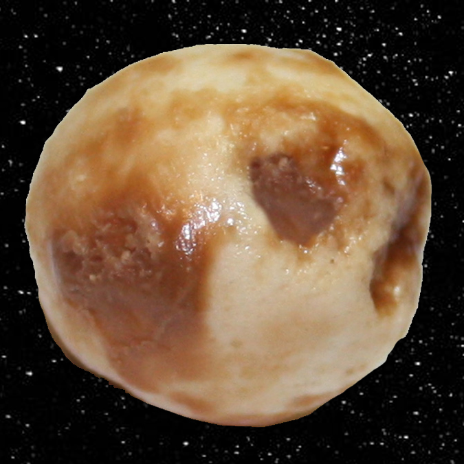 A malteser with the chocolate licked off and now looks like the planet Callisto