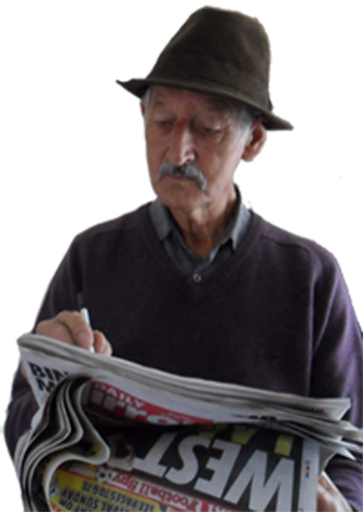 A middle aged man in a trilby hat studies the racing form in the Daily Mirror